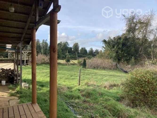 Se vende terreno con cabaña