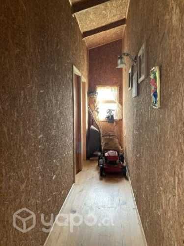 Se vende terreno con cabaña