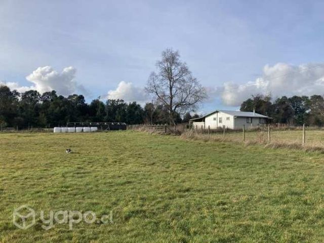 Se vende terreno con cabaña