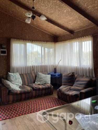 Se vende terreno con cabaña