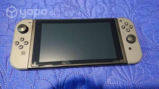 Nintendo Switch + juegos y accesorios