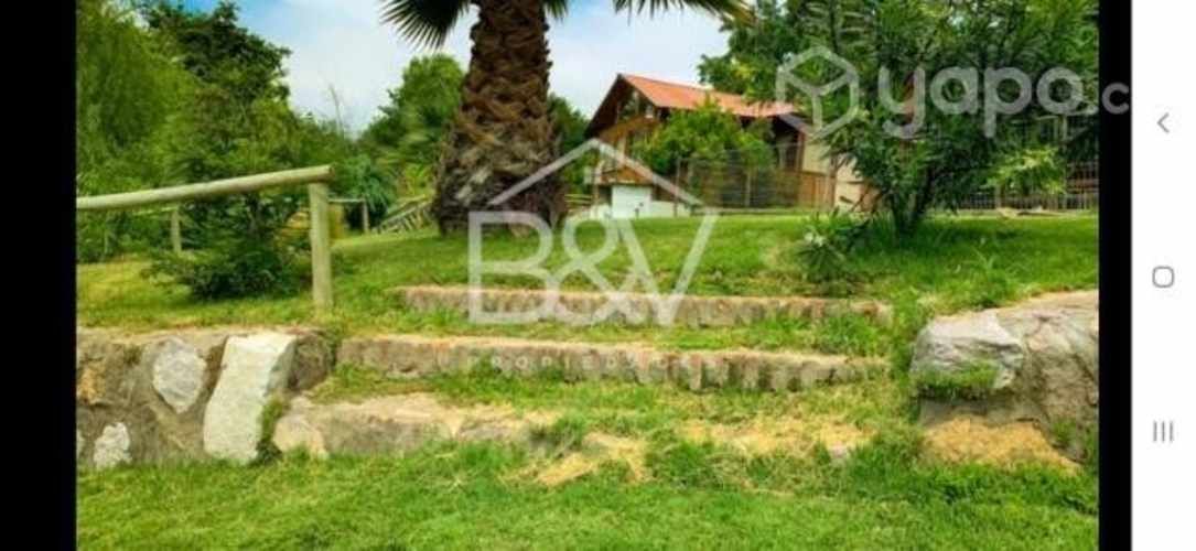 Terreno con una casa