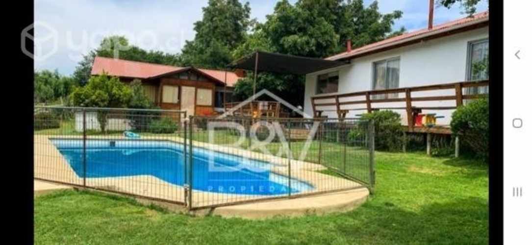 Terreno con una casa