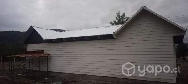 Vendo parcela con casa.