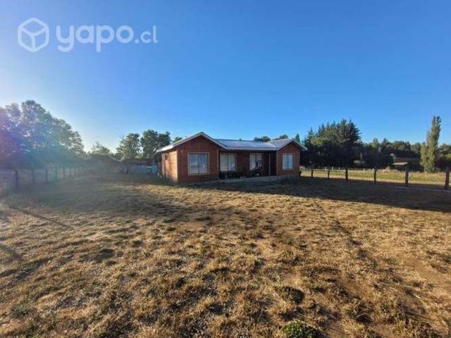 Parcela con casa en Mayulermo