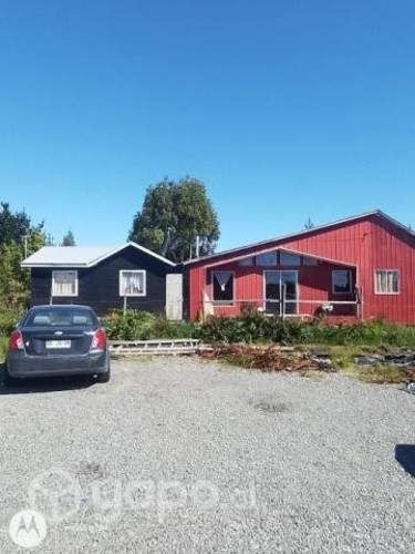 Vendo terreno con 3 cabañas