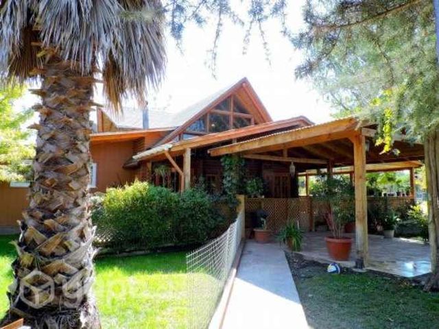 Vende hermosa parcela de 5.040 m2 con tres casas