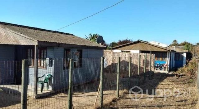 Venta terreno con 2 cabañas
