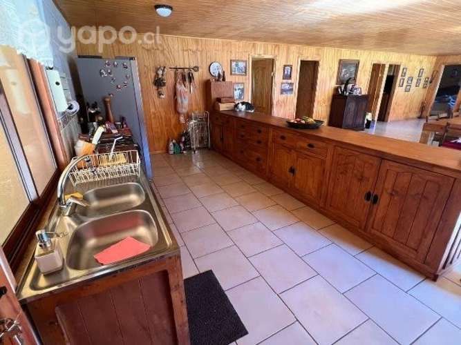 Parcela 5000 m2 con casa y piscina