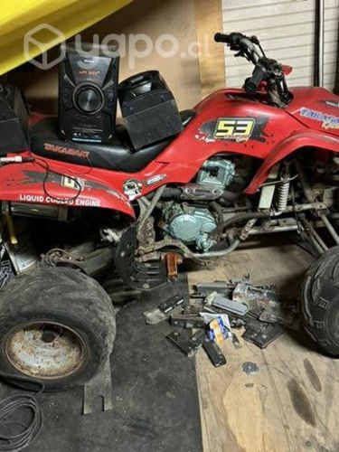 Moto cuatro ruedas takasaki