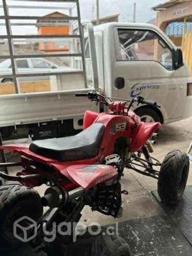 Moto cuatro ruedas takasaki