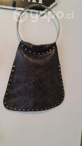 Cartera cuero tallado