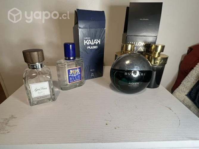 Envases de perfumes con su caja original