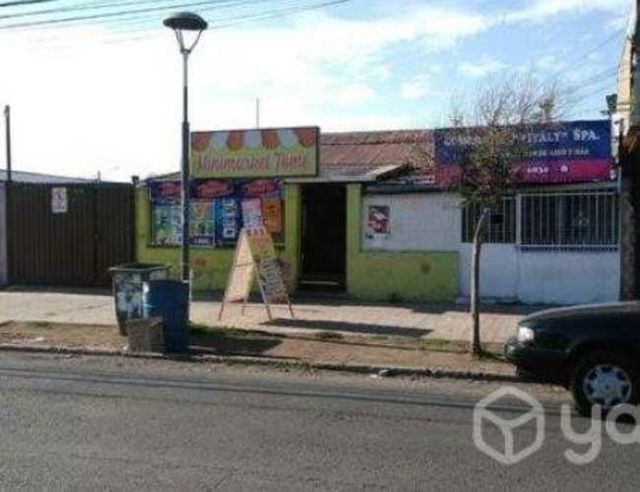 Amplia propiedad comercial con dos locales