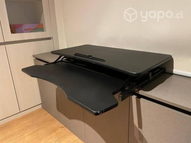 Escritorio adaptable en altura