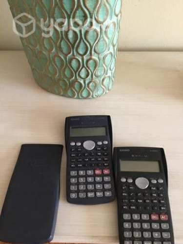 Dos calculadoras científicas una con tapa precio x