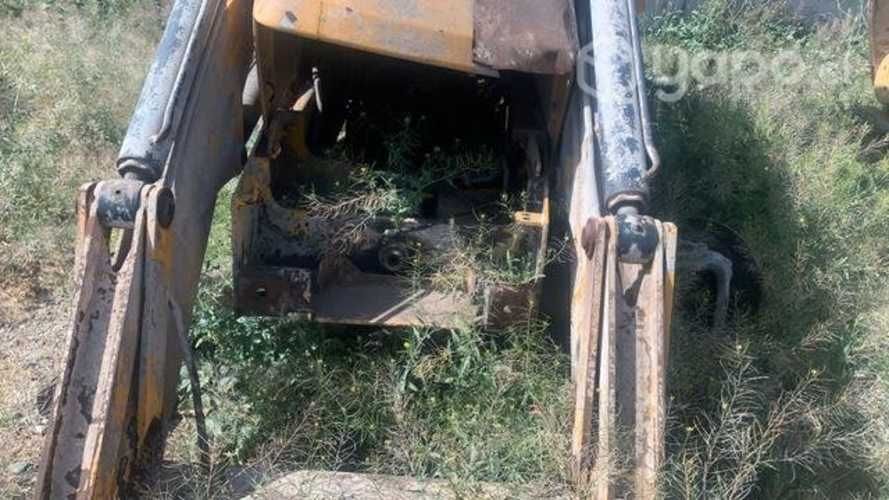 Retroexcavadora JCB 3C, cilindro hidráulico