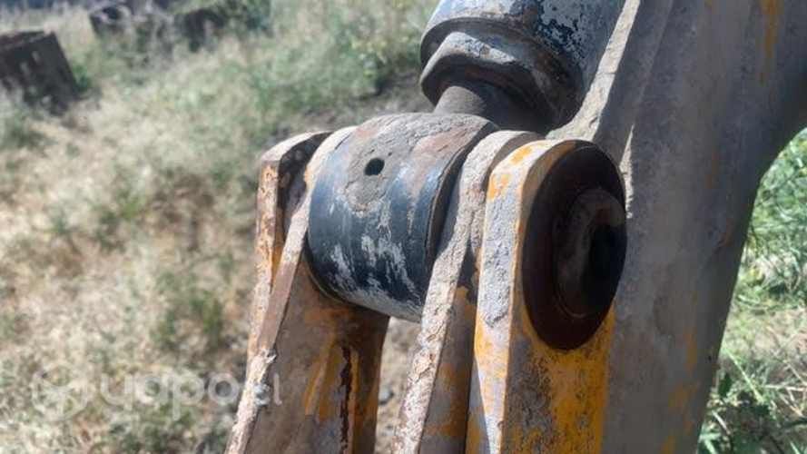 Retroexcavadora JCB 3C, cilindro hidráulico