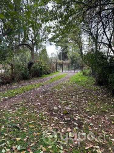 Terreno con casa sector metrenco