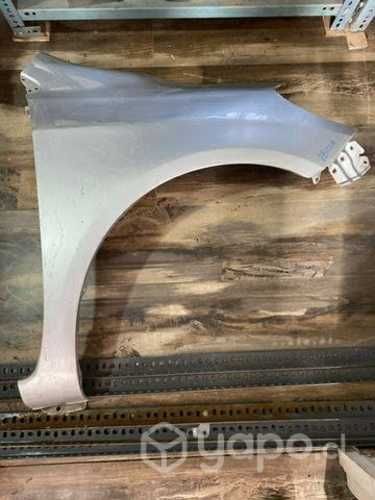 Tapabarro Nissan versa lado copiloto