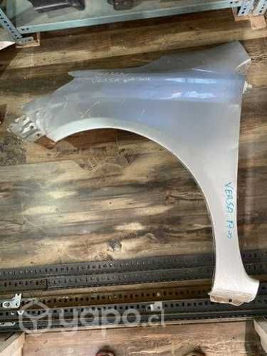 Tapabarro Nissan versa lado conductor