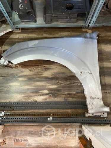 Tapabarro Nissan np 300 lado conductor