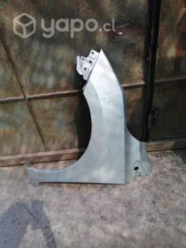 Tapabarro izquierdo nissan new versa original