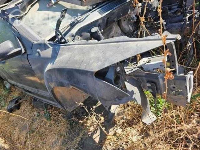 Tapabarro dodge caliber 2008