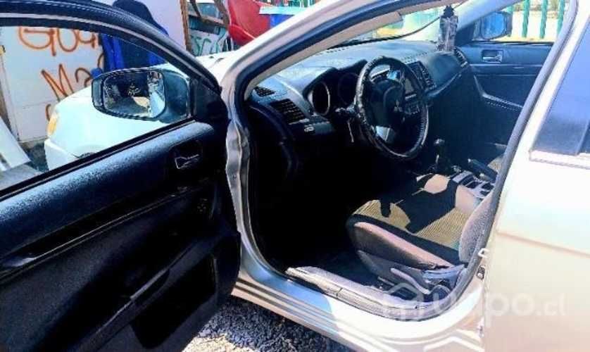 Lancer 2009 con extras