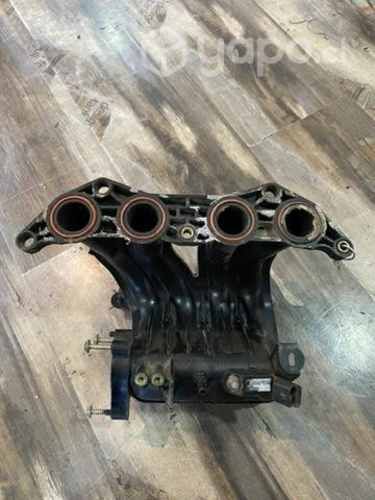 Múltiple de admisión citroen saxo año 2001