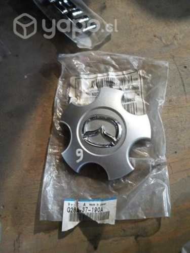 Mazda 6 tapa llanta original nuevo envio regs 2005