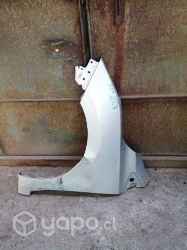 Tapabarro izquierdo nissann new versa original