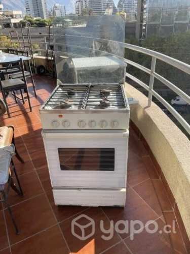 Cocina con horno 4 platos encendido piesoelectrico