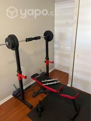 Rack con barra + Pesas con mancuernas + Banca + Ta