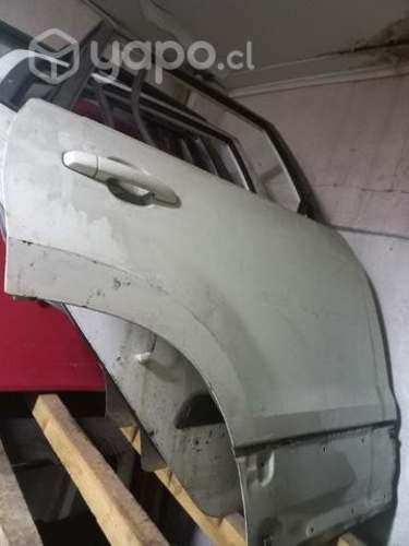 Puerta trasera derecha suzuki gran nomade 2014