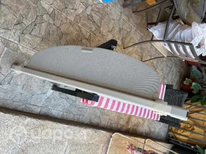 Cubre equipaje retráctil maletero