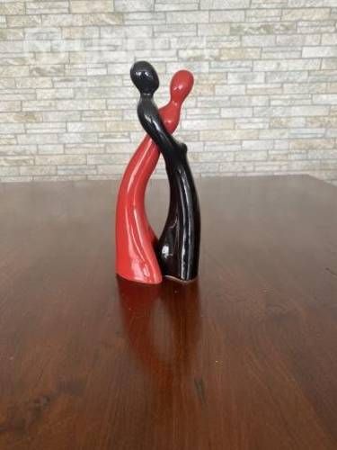 Pareja de cerámica en dos colores. Nueva