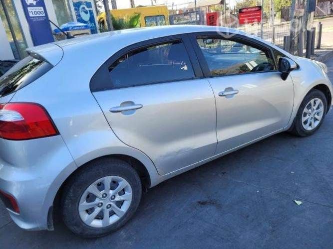 Kia rio5 buen estado 2016