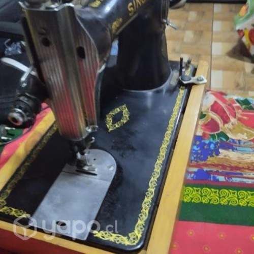 Hermosa Maquina de coser recta singer
