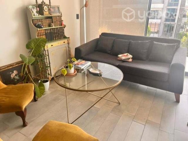 Mesa de Centro de vidrio con fierro dorado