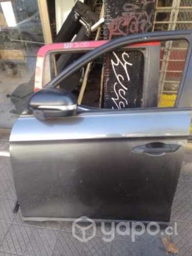 Puerta izquierda grand musso 2020