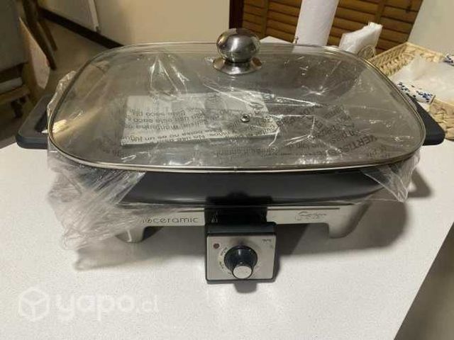 Sartén eléctrico marca Oster