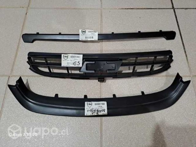 Máscara con emblema y moldura tapabarro chevrolet