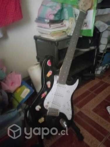 Guitarra con Amplificador