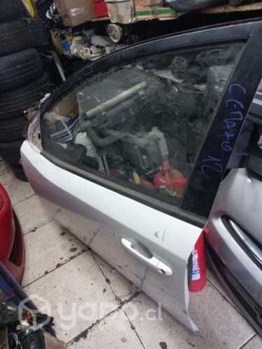 Puerta delantera izquierda kia cerato c 2011