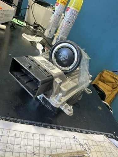 Chapa con botón Byd f0