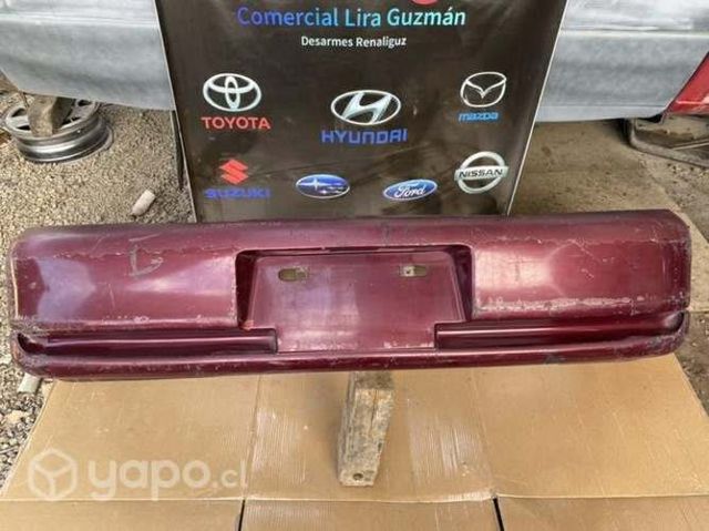 Para choque trasero kia avella