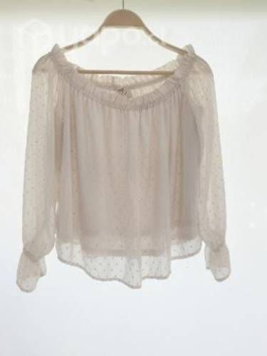 Blusa blanca veraniega marca H&M