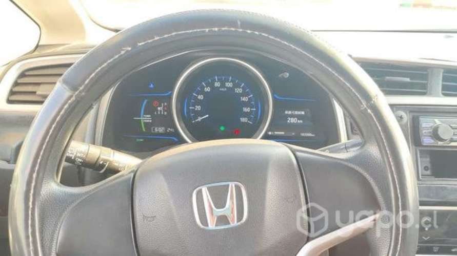 Honda fit hibrido.2015.impecable.