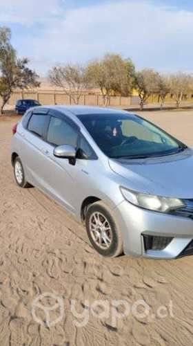 Honda fit hibrido.2015.impecable.